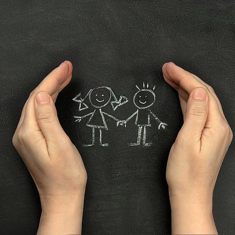 Hands,Protect,Children,Drawn,On,Blackboard,With,Chalk.,Concept,For